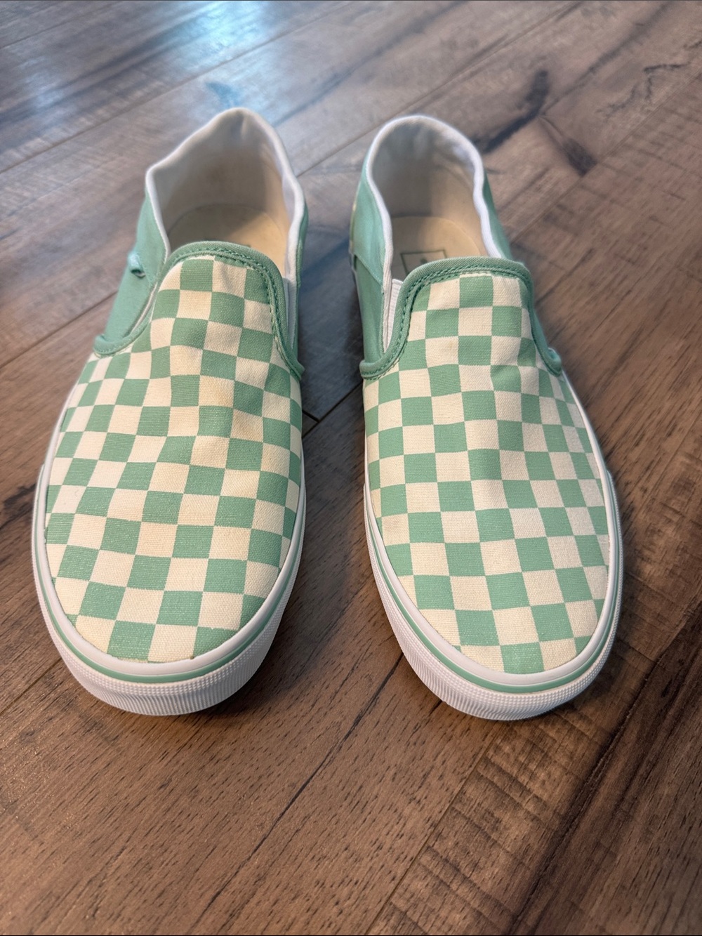 Vans Slip-On Checkerboard Sneakers in Mint and White